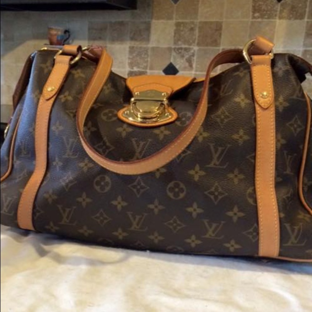 Louis Vuitton Stresa GM. Shows use, wear, and darkening on patena. Scuffed metal